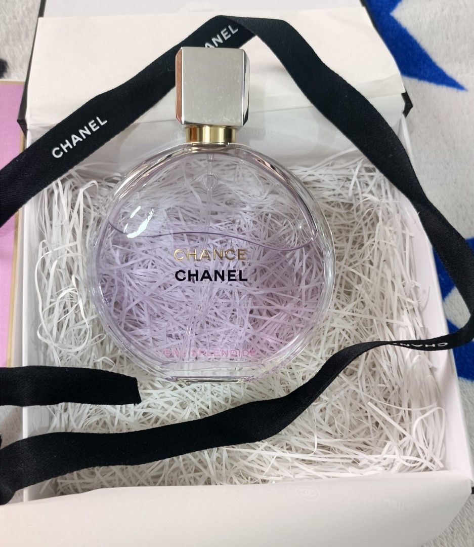 Chanel Chance Eau Splendide Eau de Parfum 3.4 fl oz (Category: Fragrance & Deodorants) located in Manila. Submitted by gonzalessa43676 (Listing ID 1464772042, Image 2). Description: - Brand: Chanel - Item: Chance Eau Splendide Eau de Parfum - Size: 3.4 fl oz / 100ml - Condition: Slightly Used - Packaging: Includes iconic round glass bottle with purple juice, pink outer box with gold lettering, and the signature white presentation box tied with a 