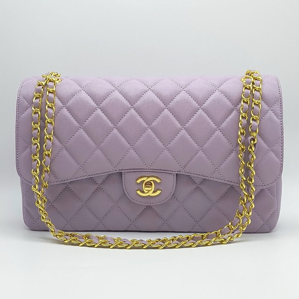 Chanel Jumbo Classic Flap Bag Lilac (Category: Luxury Bags & Wallets) located in Lapu Lapu. Submitted by theluxxaffair (Listing ID 1464925938, Image 1). Description: Chanel Jumbo Classic Flap Bag in lilac pastel purple caviar leather with gold-tone hardware. Features the signature diamond quilting, CC turn-lock closure, leather-interwoven chain strap and rear slip pocket. Double-flap interior with multiple compartments and pockets. Length: 30 cm 