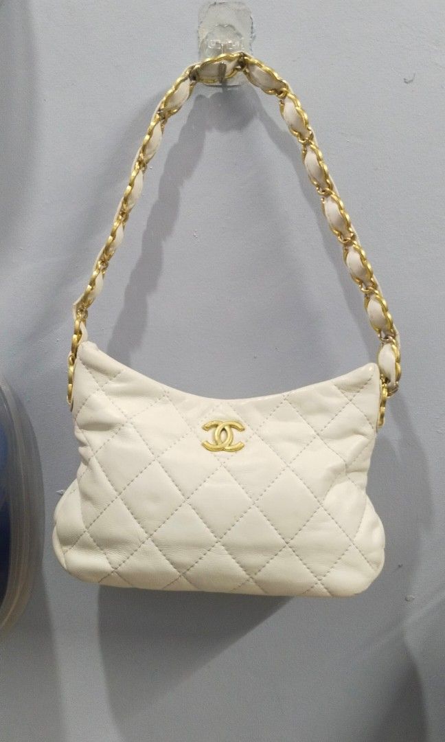 Chanel Quilted Hobo Bag (Category: Luxury Bags & Wallets) located in Trece Martires City. Submitted by vherma (Listing ID 1464776767, Image 2). Description: Chanel Quilted Hobo Bag microchip.