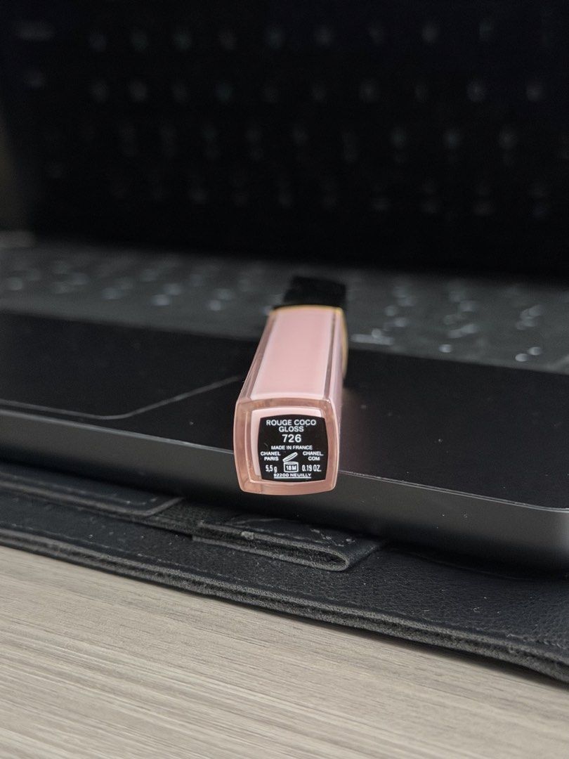 Chanel Rouge Coco Gloss 726 (Category: Makeup) located in Manila. Submitted by karminareyes123 (Listing ID 1464921217, Image 3). Description: - Brand: Chanel - Product: Rouge Coco Gloss - Shade: 726 (Gorgeous Pink) - Finish: High Shine - Size: 5.5g / 0.19 oz - Origin: Made in France - Features: Classic packaging with iconic interlocking CC logo on top, clear shade label at the bottom, and standard applicator tube..