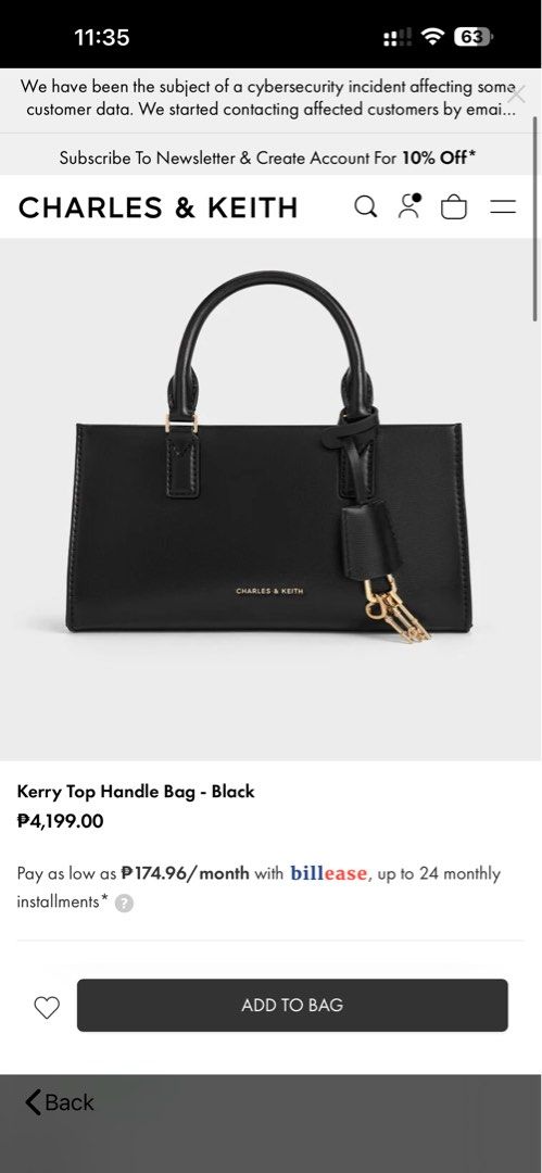 Charles & Keith Kerry Top Handle Bag Black (Category: Tote Bags) located in Manila. Submitted by kimmmmy_ (Listing ID 1464793796, Image 1). Description: - Authentic Charles & Keith Kerry top handle bag in versatile black - Structured rectangular shape with elegant gold hardware - Includes a stylish lock charm accessory on the handle - Clean, smooth exterior finish that pairs with any outfit - Spacious interior with plenty of room for daily essent