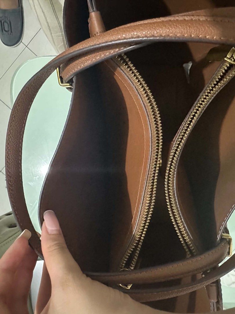 Charles & Keith Sansa Tote (Category: Tote Bags) located in Quezon City. Submitted by migswee07 (Listing ID 1464871805, Image 3). Description: Bag in Chocolate/Brown XL 3k Negotiable Lightly Used.