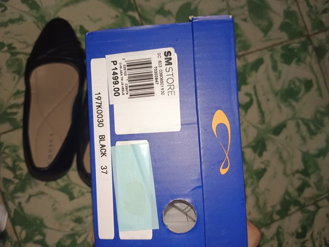 Chesca Black Heels Size 37 with Box (Category: Heels) located in Manila. Submitted by maulionjus77854 (Listing ID 1464807479, Image 2). Description: - Brand: Chesca - Size: 37 - Color: Black - Condition: Brand new, never worn, pristine condition - Features: Elegant block heel with pleated strap detail and comfortable neutral inner lining - Inclusions: Original blue box from SM Store with original ₱1,499 price tag attached.