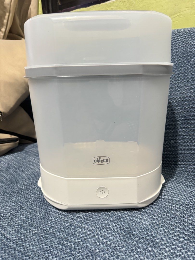Chicco 3-in-1 Electric Steam Sterilizer (Category: Breastfeeding & Bottle Feeding) located in Caloocan City. Submitted by brightphoenix_f74c63 (Listing ID 1464782943, Image 1). Description: - Complete Package with Box - Used only twice then naging storage nalang sya ng baby bottles since we have another sterilizer.