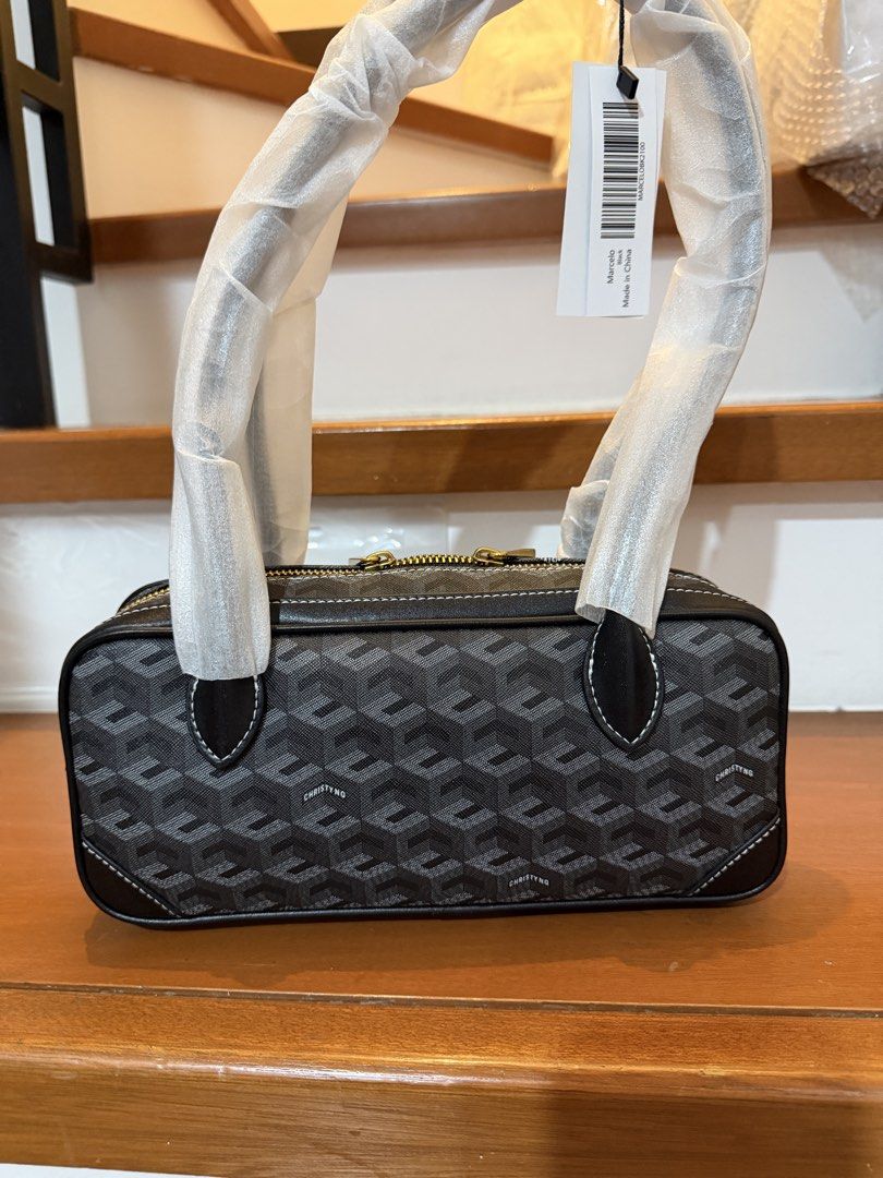 Christy Ng Marcelo Shoulder (Category: Luxury Bags & Wallets) located in Manila. Submitted by maryjoremf13085 (Listing ID 1464965751, Image 2). Description: - Brand: Christy Ng Marcelo - Condition: Brand new with tags (BNWT), handles still in protective foam - Design: Geometric pattern with stylish contrast stitching - Hardware: Premium gold-toned hardware - Compartments: Secure top zipper closure plus a handy front compartment - Colors Available