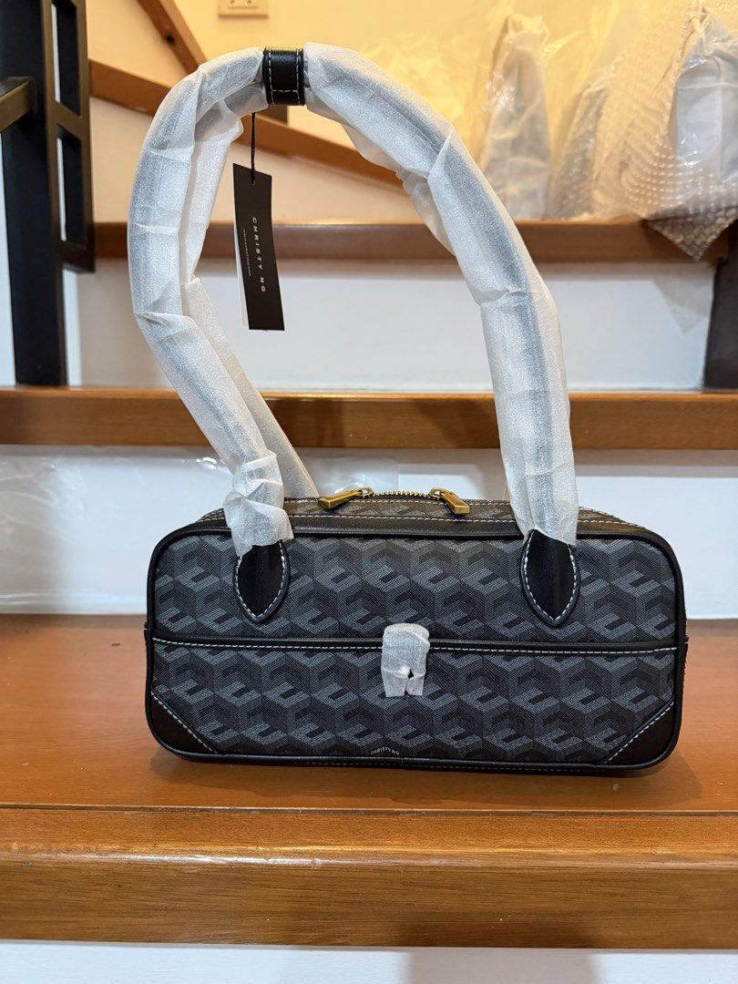 Christy Ng Marcelo Shoulder (Category: Luxury Bags & Wallets) located in Manila. Submitted by maryjoremf13085 (Listing ID 1464965751, Image 1). Description: - Brand: Christy Ng Marcelo - Condition: Brand new with tags (BNWT), handles still in protective foam - Design: Geometric pattern with stylish contrast stitching - Hardware: Premium gold-toned hardware - Compartments: Secure top zipper closure plus a handy front compartment - Colors Available