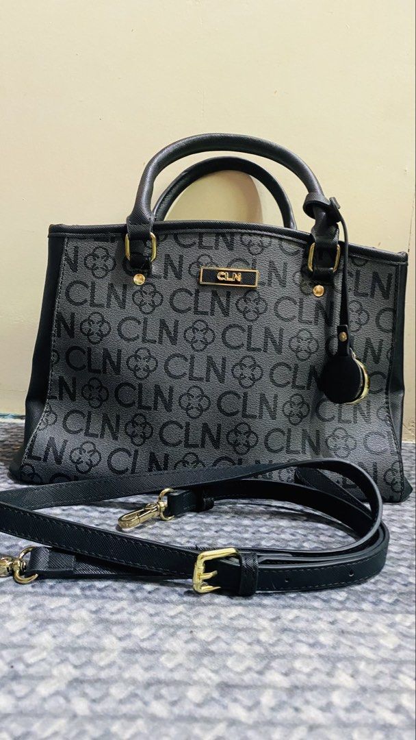 CLN Monogram Tote Bag with Detachable Strap (Category: Luxury Bags & Wallets) located in Santiago. Submitted by kjuvieann39 (Listing ID 1464804227, Image 1). Description: - Brand: CLN - Color/Pattern: Black with grey all-over monogram - Hardware: Gold-tone with front CLN logo plaque - Straps: Dual top handles + adjustable, detachable shoulder strap - Interior: Fabric-lined with a center zipped compartment divider - Condition: Good, spacious for d