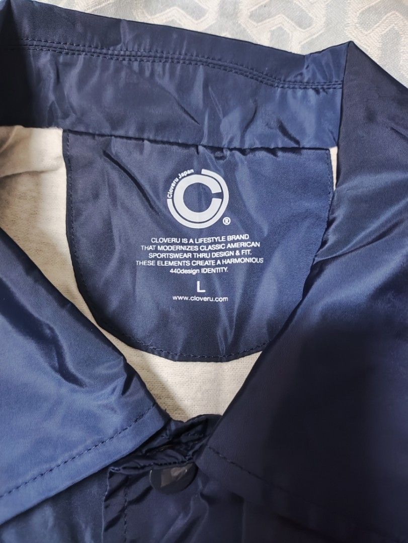 Cloveru tiger x sho watanabe (Category: Coats, Jackets and Outerwear) located in Bacoor. Submitted by silverdeer-ba35 (Listing ID 1464892076, Image 2). Description: forsale Cloveru tiger®️ x sho watanabe Coach jacket navy blue authentic japan made size. Large actual dimes. 26 x 30 as new condition sariwa no issue 6000 lang yours na bacoor cavite location Dm📩 sure buyer..tnxxx.