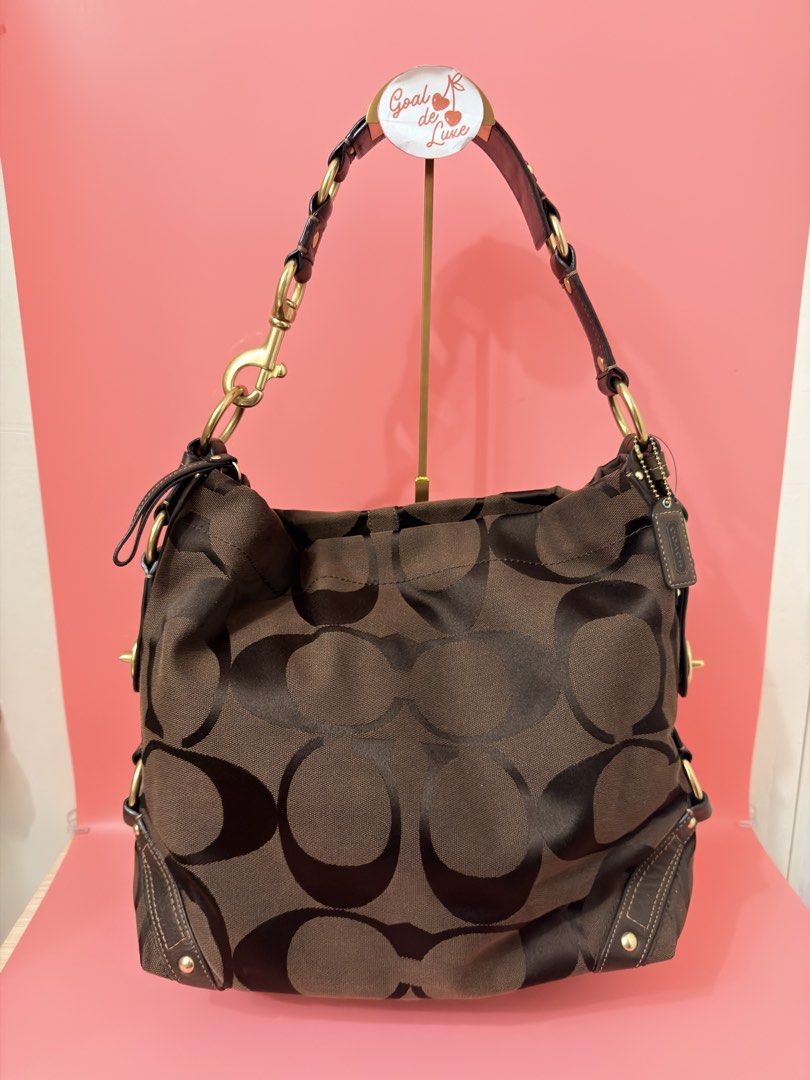 Coach Carly Large Choco Brown Shoulder bag (Category: Luxury Bags & Wallets) located in Dasmarinas. Submitted by goaldeluxe (Listing ID 1464781224, Image 1). Description: Like new condition. No rubs at all!! 📍Cavite.