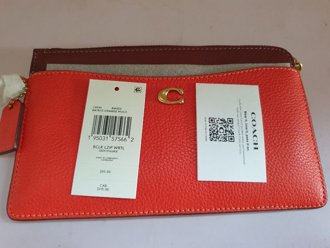 Coach Colorblock L-Zip Wristlet Red Orange Multi (Category: Wallets & Card holders) located in Las Pinas. Submitted by anggesmart (Listing ID 1464868727, Image 3). Description: - Brand: Coach - Style Number: C8569 - Color: Red orange multi with dark burgundy trim - Material: Textured leather with gold-tone hardware - Features: Signature C logo, top zip closure, attached wrist strap, exterior card slots, and interior fabric lining with Coach creed