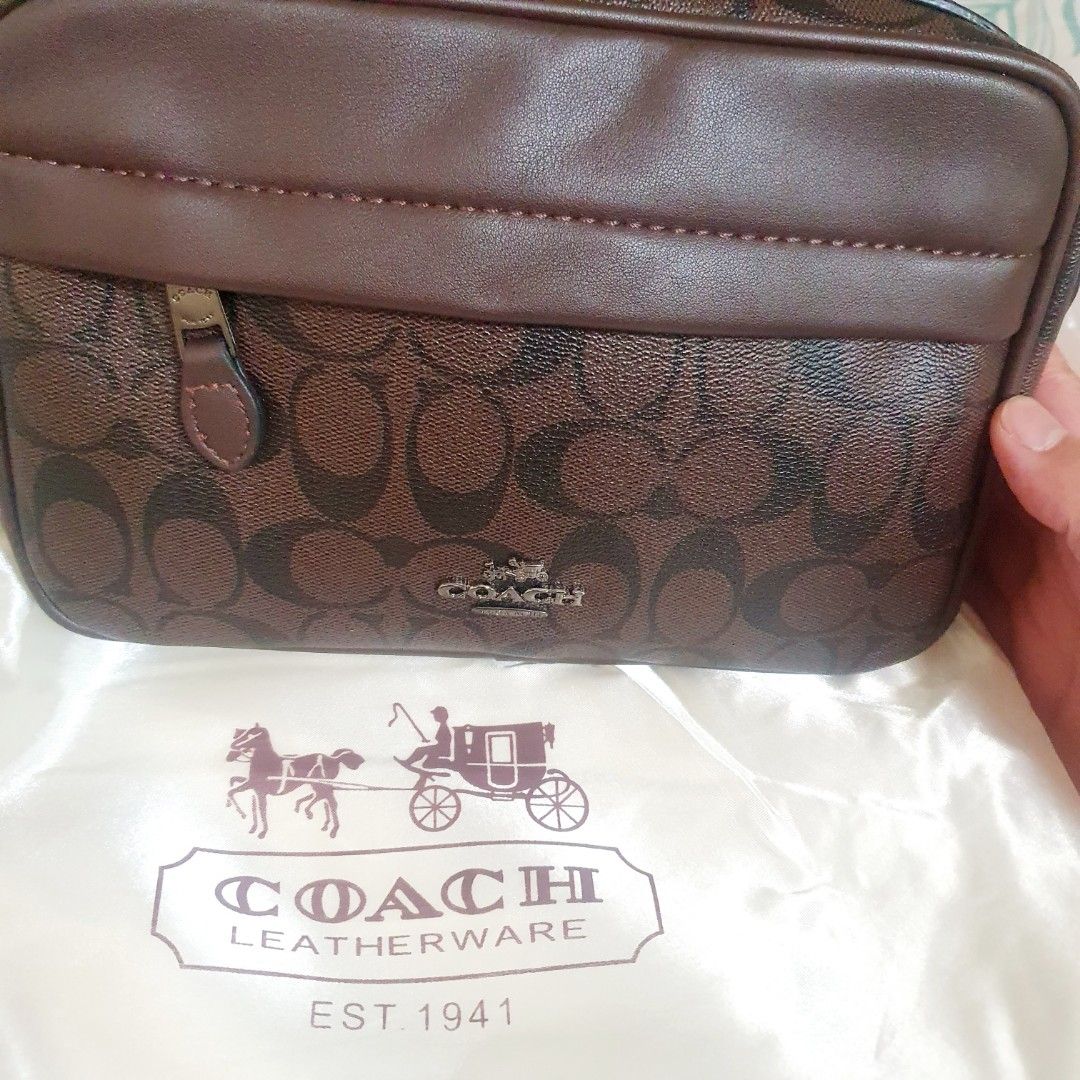 Coach graham crossbody bag (Category: Sling Bags) located in Pateros City. Submitted by doiski (Listing ID 1464829488, Image 1). Description: Coach graham body bag Php3000. Gift by my sister from Hongkong. Rfs: i don't use sling bag or body bag. Not for me. New. With box. Taguig loc. Thank you..