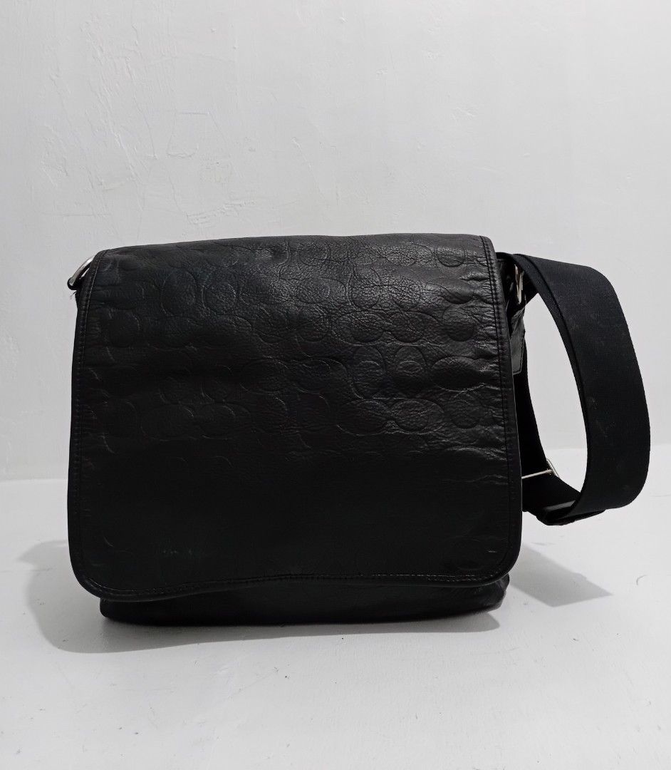 COACH HERITAGE MESSENGER BAG (Category: Luxury Bags & Wallets) located in Navotas City. Submitted by riyuwi (Listing ID 1461729889, Image 2). Description: PREOWNED lightly Used WellUsed Authentic Vintage OACH HERITAGE BLACK LEATHER EMBOSSED C MAP MESSENGER BAG MENS BLACK MEDIUM-LARGE Sign of Used wth Creed flaws : Sign of Used sa lining inside ,lightly Fade, No Otherr Issue 8.9/10 .