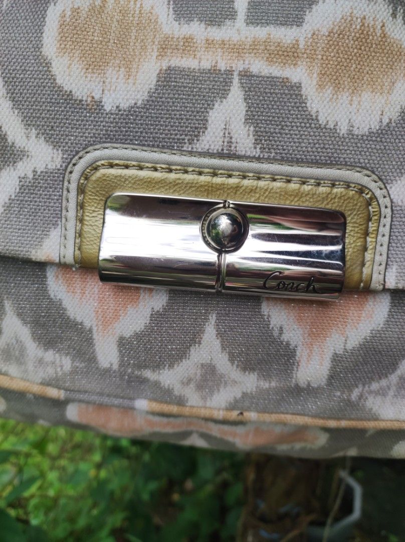 Coach Kristin Ikat Hobo (Category: Luxury Bags & Wallets) located in Naguilian. Submitted by a2aonlineshop (Listing ID 1464856747, Image 2). Description: Style no.: Coach no. 16983 Model: Coach Kristin Ikat Hobo Design/Pattern: Op Art Ikat print Color: ivory, gray, coral & tan Manufactured Date: Feb, 2011 (vintage) Material: Canvas with touch of pattent leather Condition: like new, nothing to explain the owner never used it..
