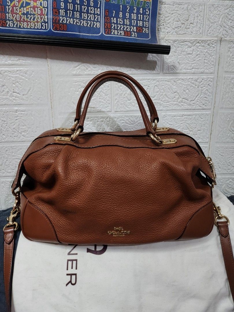 Coach Lane Satchel Bag (Category: Luxury Bags & Wallets) located in Caloocan City. Submitted by xcessbaggs (Listing ID 1464962519, Image 1). Description: New Arrival!!! In good pre-loved condition from Korea. 📌Materials: Crafted from a mix of textured polished pebble leather and smooth refined calf leather. 📏Dimensions: Approximately 12" L x 7" H x 5.5" W. See photos and item specifics for details and condition ✉️Send me a message for queries a