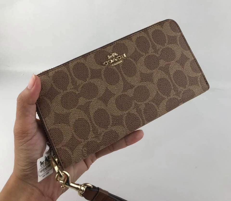 Coach Long Wallet (Category: Wallets & Card holders) located in Quezon City. Submitted by bagsboutiqueph (Listing ID 1464857789, Image 3). Description: LAST PRICE POSTED. LIMITED STOCKS! BRANDNEW WITH INCLUSIONS. COLOR MAY SLIGHTLY VARY IN ACTUAL DUE TO LIGHTING AND CAMERA SETTING. OTHER PHOTOS WILL BE SEND DURING PURCHASE AND FOR SURE BUYERS ONLY. WHEN IN DOUBT, DO NOT ORDER. THANK YOU..