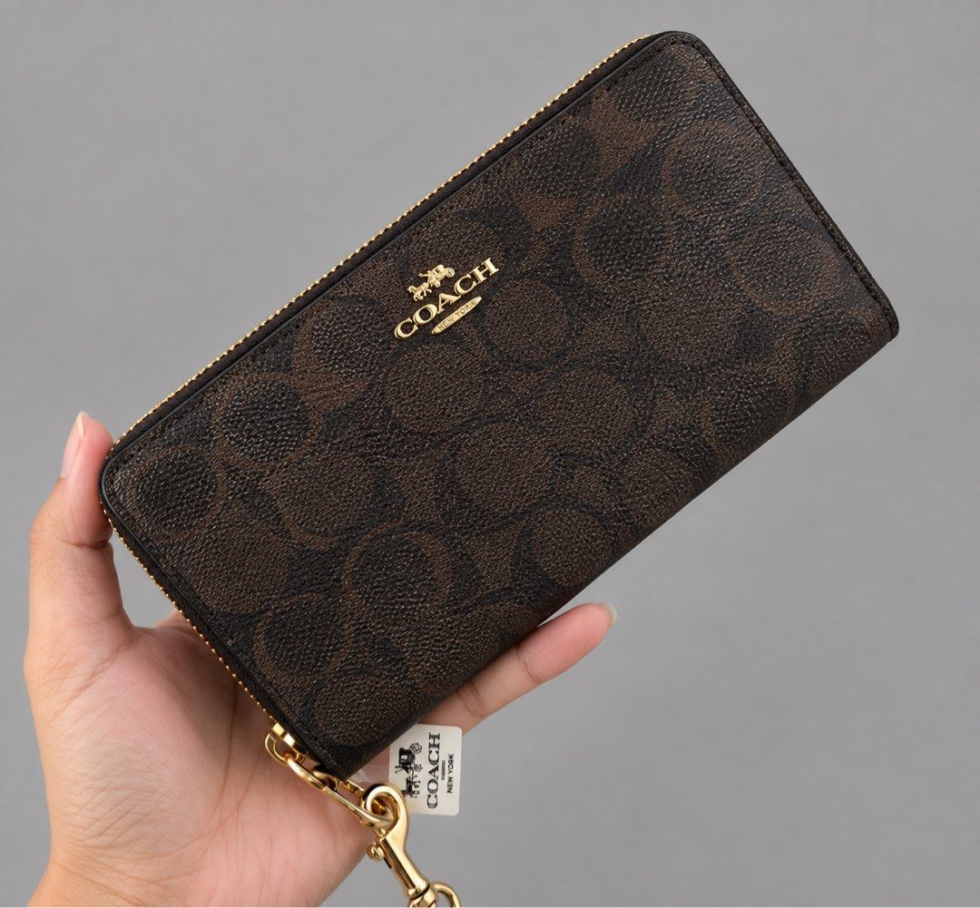 Coach Long Zip Around Wallet (Category: Wallets & Card holders) located in Binan City. Submitted by pinkykeenshop (Listing ID 1464898793, Image 1). Description: .