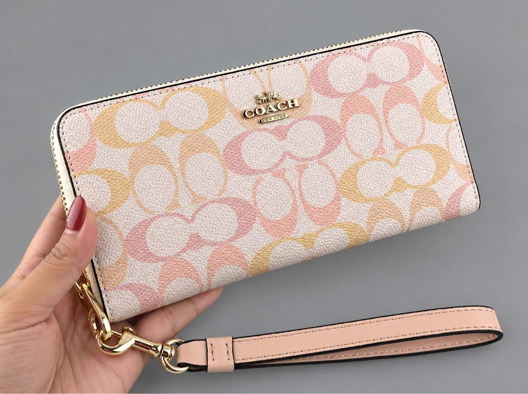 Coach Long Zip Around Wallet (Category: Wallets & Card holders) located in Binan City. Submitted by pinkykeenshop (Listing ID 1464899454, Image 1). Description: .