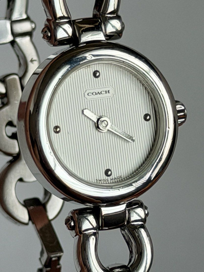 Coach Neo-Vintage Y2K (Category: Women's Watches) located in Manila. Submitted by vibeandvintage (Listing ID 1464811384, Image 3). Description: ⌚️ Coach Neo-Vintage Y2K •Ladies •Quartz movement •Off-white/silver vertical pinstripe patterned guilloché texture dial •Stainless steel case and bracelet •Up to 6.5 inches wrist size •20mm case diameter (excluding crown) •With signs of usage •All-original watch head and bracelet •Good working condition •