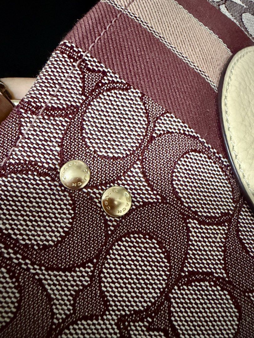 Coach Outlet Dempsey Carryall (Category: Shoulder Bags) located in Manila. Submitted by ihshey (Listing ID 1464896090, Image 3). Description: Coach Outlet Dempsey Carryall Signature Jacquard with Stripe & Coach Patch 👜 ✨ Condition: 9/10 - Gently used — only worn 3x since purchase - Has visible signs of use on the purse feet (please see photos) - Personally purchased in Japan 🇯🇵 - Bought from Mitsui Outlet Park Tama Minami-Osawa RFS: Declutteri