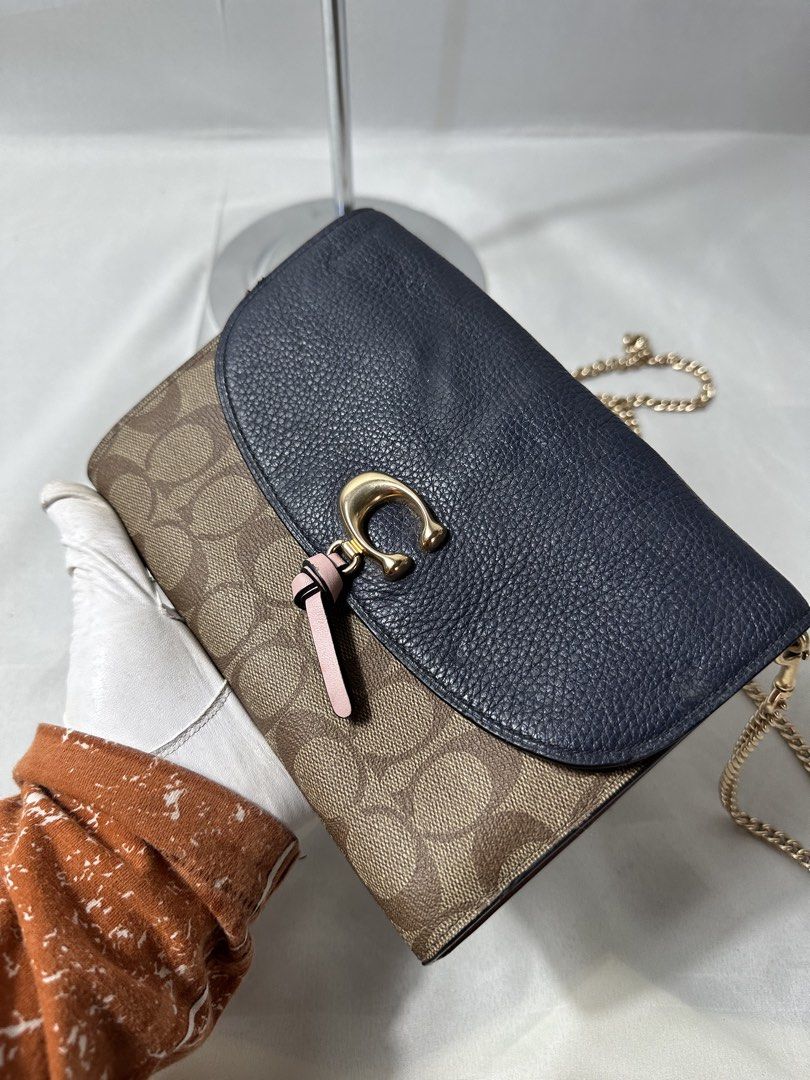 Coach Remi Chain Cross Body (Category: Cross-body Bags) located in Cabanglasan. Submitted by thefashiongarage.co (Listing ID 1464835394, Image 3). Description: Coach Remi Chain Cross Body Bag Minimal sign of wear and leather scratches .