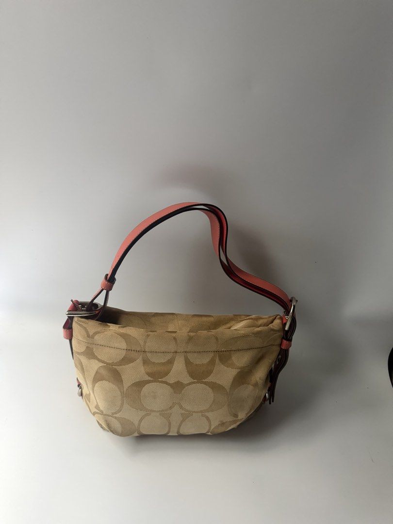 Small Coach Signature Canvas Bag (Category: Luxury Bags & Wallets) located in Mandaluyong City. Submitted by n444m (Listing ID 1464815628, Image 2). Description: Coach Signature Canvas Bag -minimal sign of usage -w free charm.