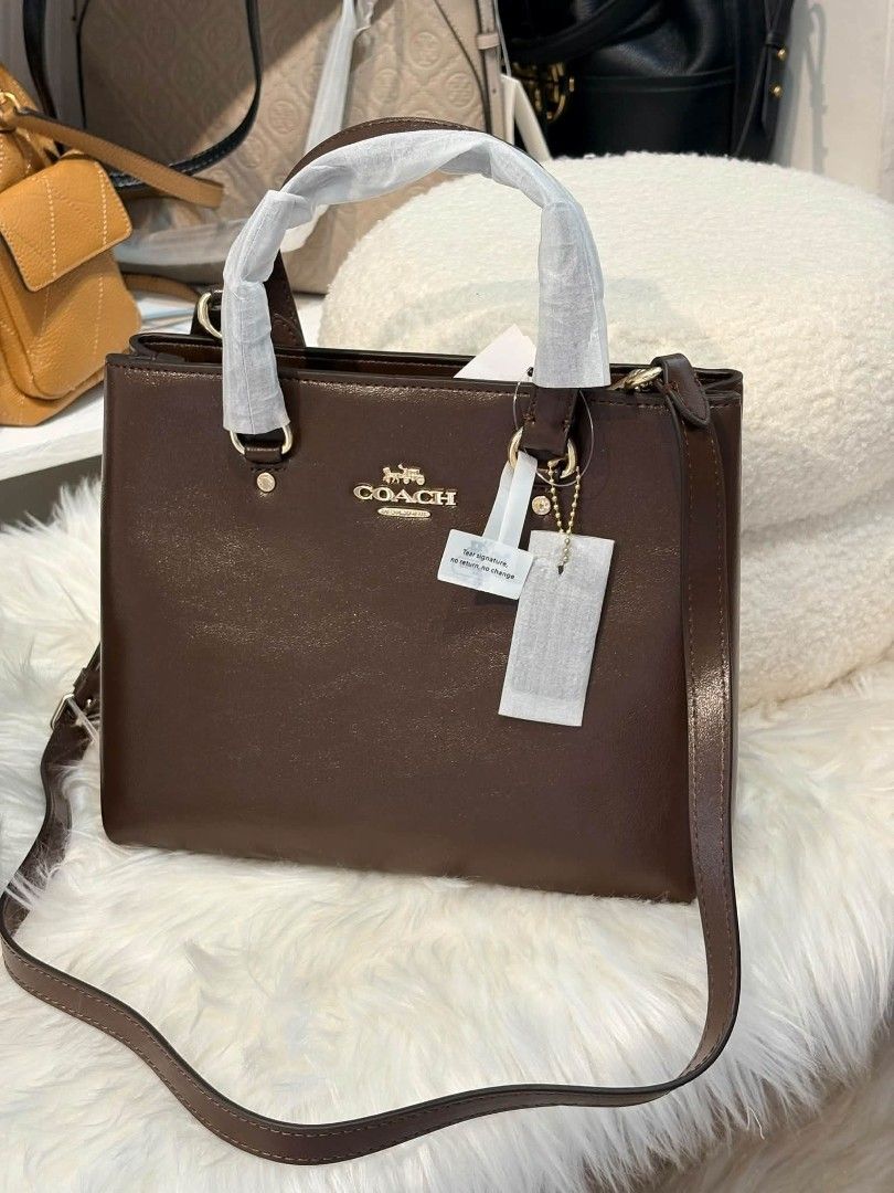 Coach Station Carryall in Maple (Category: Cross-body Bags) located in Quezon City. Submitted by bagsboutiqueph (Listing ID 1464968116, Image 1). Description: LAST PRICE POSTED. LIMITED STOCKS! BRANDNEW WITH INCLUSIONS. COLOR MAY SLIGHTLY VARY IN ACTUAL DUE TO LIGHTING AND CAMERA SETTING. OTHER PHOTOS WILL BE SEND DURING PURCHASE AND FOR SURE BUYERS ONLY. WHEN IN DOUBT, DO NOT ORDER. THANK YOU..
