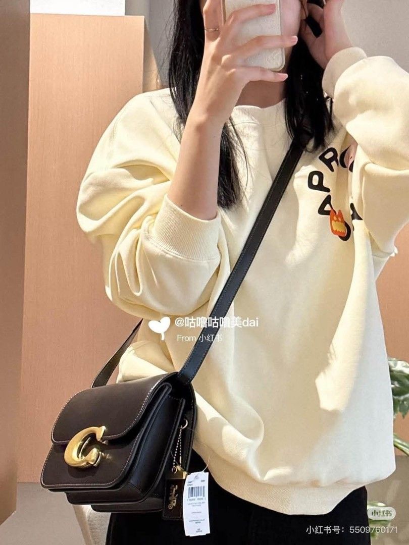 Coach Tabby Shoulder Bag (Category: Shoulder Bags) located in Manila. Submitted by onlineshopmate (Listing ID 1464943251, Image 2). Description: - Authentic Coach Tabby shoulder bag - Available in classic black, brown, and tan - Features iconic chunky hardware on the front flap - Structured leather body with organized multiple compartments - Includes two interchangeable straps: chunky chain and leather crossbody - Perfect, versatile piece for eve