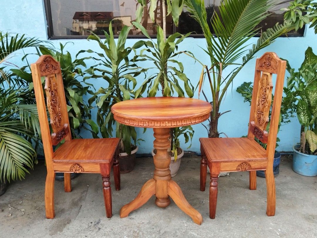 Coffee Table Set (Category: Tables & Sets) located in Meycauayan. Submitted by marygracecasimiro (Listing ID 1464830289, Image 3). Description: 2 Seater Coffee Table Set made of solid Narra Wood. Table with 1pc top. Restored and revarnished. Ready to use. Get it for only P15,000 ♥️ Size Table D26 x H30 Chairs L17 x W16 x SH18 x H43 inches.