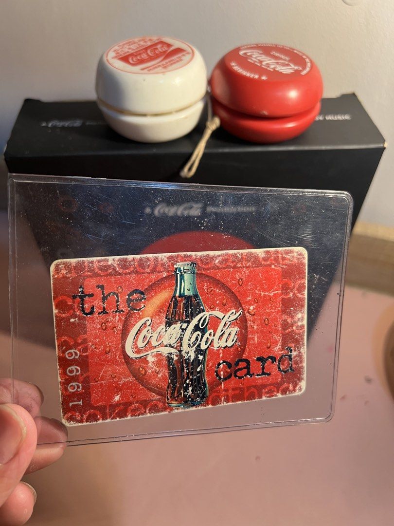Coke collectibles (Category: Headphones & Headsets) located in Manila. Submitted by cterrineni76861 (Listing ID 1464884088, Image 3). Description: - Coke Studio headphones in red and white packaging - Two Coca-Cola Russell yo-yos (one red, one white) - Extra red cable included - Vintage 1999 Coca-Cola card in a protective top loader sleeve - Great bundle for Coca-Cola merchandise and memorabilia collectors.