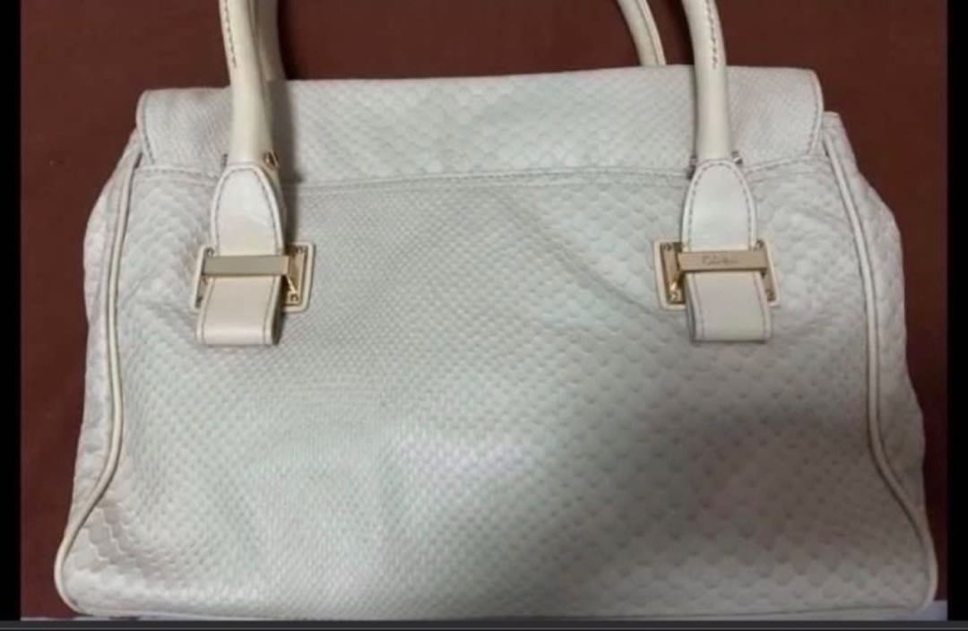 Cole Haan handbag (Category: Tote Bags) located in Manila. Submitted by bwshoppe (Listing ID 1464905130, Image 2). Description: Brand new with tag. Very classy & stylish. Size: Approximately 9.5” Hx 12 “Lx 4.5” base Made of soft leather. Easy & light to carry bag. .