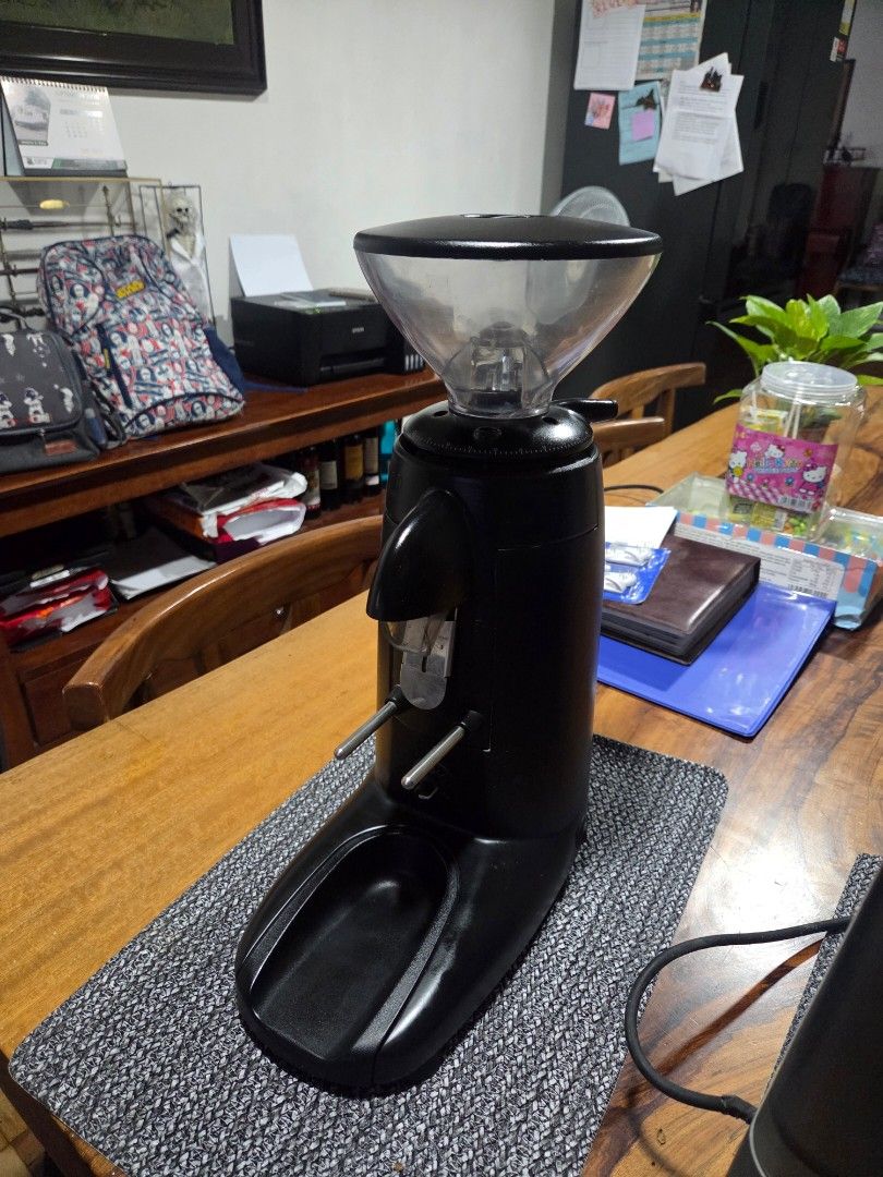 Compak K3 Touch Coffee Grinder Espresso (Category: Coffee Machines & Makers) located in Makati City. Submitted by suaveruiz (Listing ID 1464880749, Image 2). Description: - Model: Compak K3 Touch Coffee Grinder - Finish: Sleek matte black, made in Spain (230V) - Condition: Clean, powers on and works perfectly with minor counter wear - Features: Clear bean hopper and digital settings underneath - Setup: Standard portafilter holder, ideal for home 