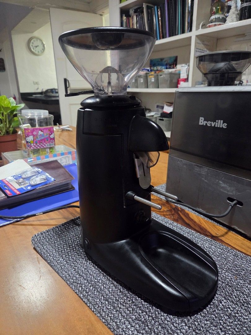Compak K3 Touch Coffee Grinder Espresso (Category: Coffee Machines & Makers) located in Makati City. Submitted by suaveruiz (Listing ID 1464880749, Image 1). Description: - Model: Compak K3 Touch Coffee Grinder - Finish: Sleek matte black, made in Spain (230V) - Condition: Clean, powers on and works perfectly with minor counter wear - Features: Clear bean hopper and digital settings underneath - Setup: Standard portafilter holder, ideal for home 