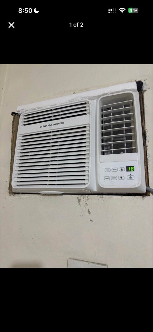 Condura Inverter Window Type Air Conditioner (Category: Air Conditioning and Heating) located in Bulacan. Submitted by zealeagle_33f4cd (Listing ID 1464891375, Image 1). Description: - Brand: Condura Window Type Inverter Air Conditioner 1.0 - Color: Clean White - Display: Digital temperature display (currently set to 18°C) - Controls: Easy-to-use buttons for Power, Mode, Fan, Timer, Swing, and Up/Down adjustment arrows - Airflow: Main airflow lou