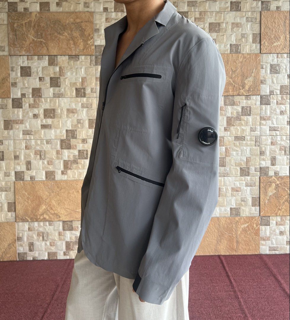 CP COMPANY - WATERPROOF ZIP UP JACKET (Category: Coats, Jackets and Outerwear) located in Bacolod City. Submitted by timelessbyjosh (Listing ID 1461013440, Image 2). Description: BEST FOR OUTDOOR OUTFITS SIZE : ACTUAL COLOR : GREY & BLACK COLOR RATE : 10 OUT OF 10 CONDITION : GOOD MATERIAL : 82 % POLYAMIDE & 18 % ELASTANE MADE IN : CHINA FLAWS : SOME AREA NEED TO BE REGLUED ( SEE LAST PHOTO FOR REFENCE ) DIMENSIONS LENGTH - 29 WIDTH ( ARMPIT TO A
