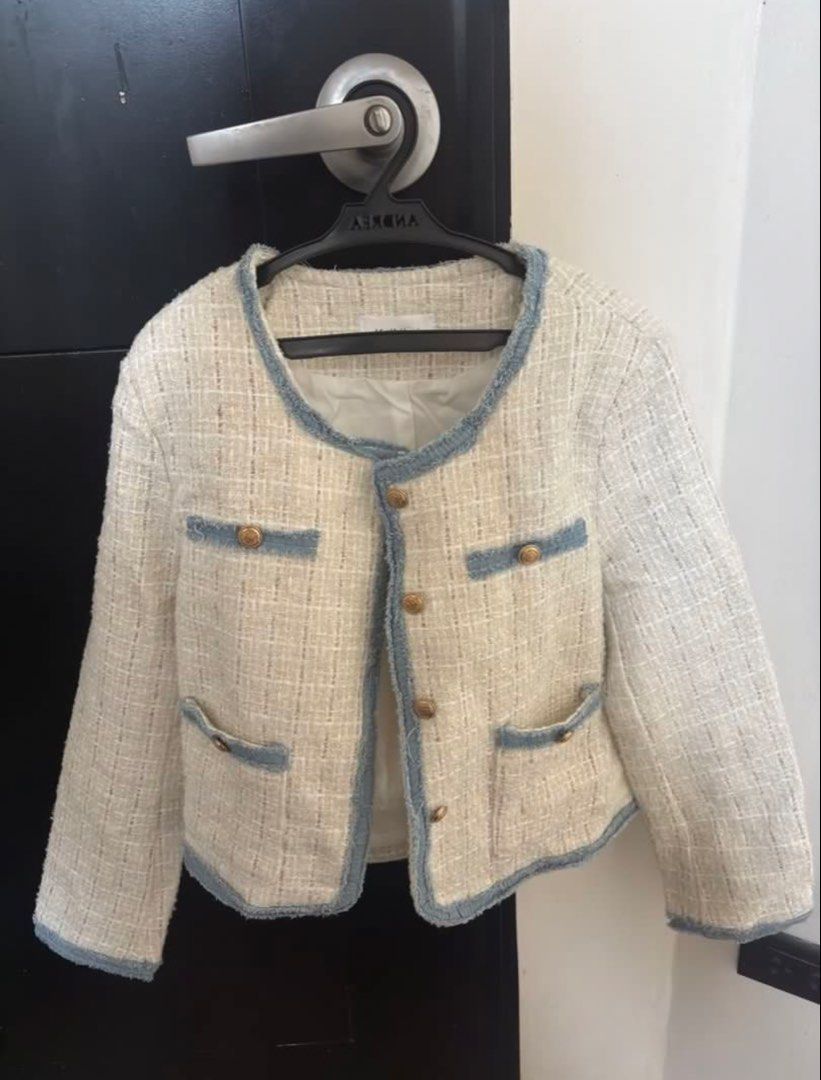 Cream and Blue Tweed Cropped Jacket (Category: Coats, Jackets and Outerwear) located in Manila. Submitted by xoxo_tine (Listing ID 1464791709, Image 3). Description: - Condition: Like new, worn only once for a photo shoot (pristine condition) - Color/Design: Cream tweed with chic light blue frayed trim - Details: Luxurious gold-tone front buttons and four front pockets - Fit & Comfort: Long sleeves, classic round collar, and fully lined interior 