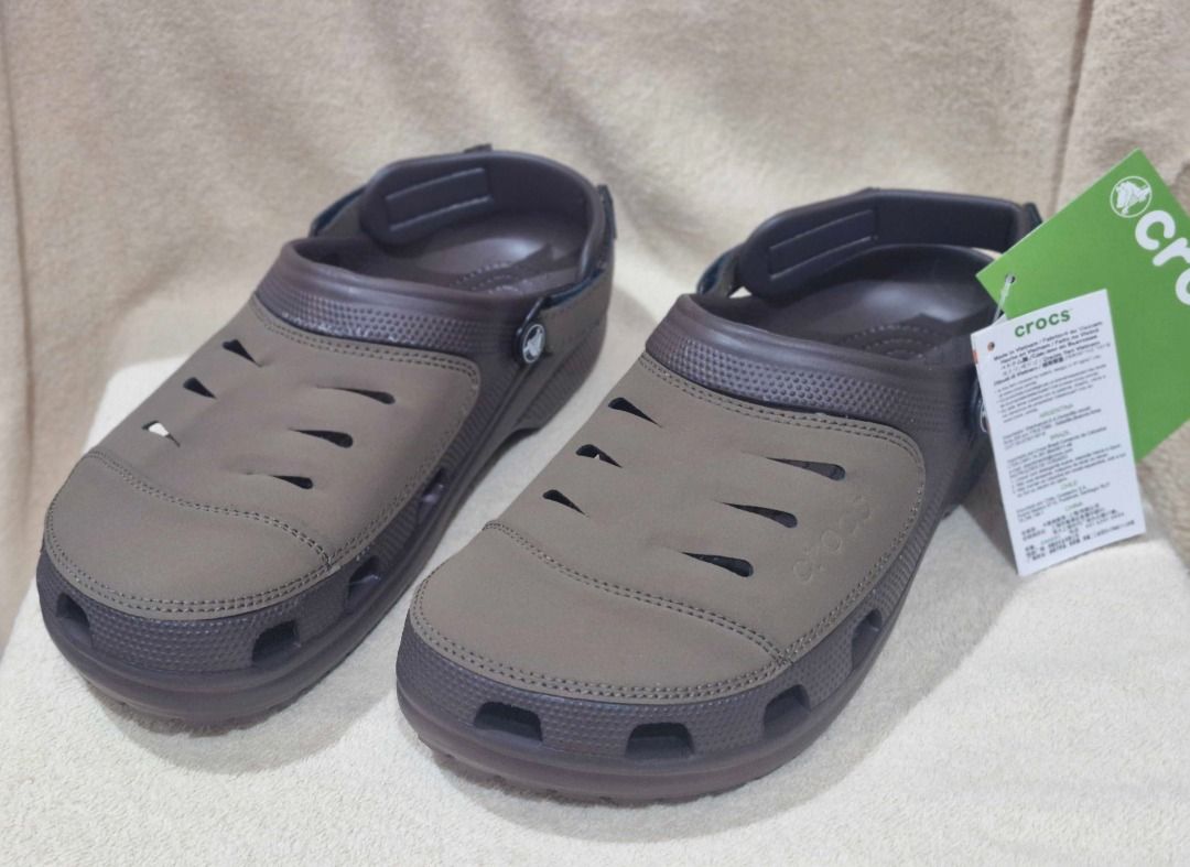 Crocs Sandals with Adjustable Strap (Category: Slippers & Slides) located in Davao. Submitted by j_guitarist (Listing ID 1464966831, Image 2). Description: - Size: EU size 42-43, US size 9 - Inner length size: 27 cm - Color: Brown - Brand: Crocs - Fit: Adjustable heel strap for a secure and comfortable fit .