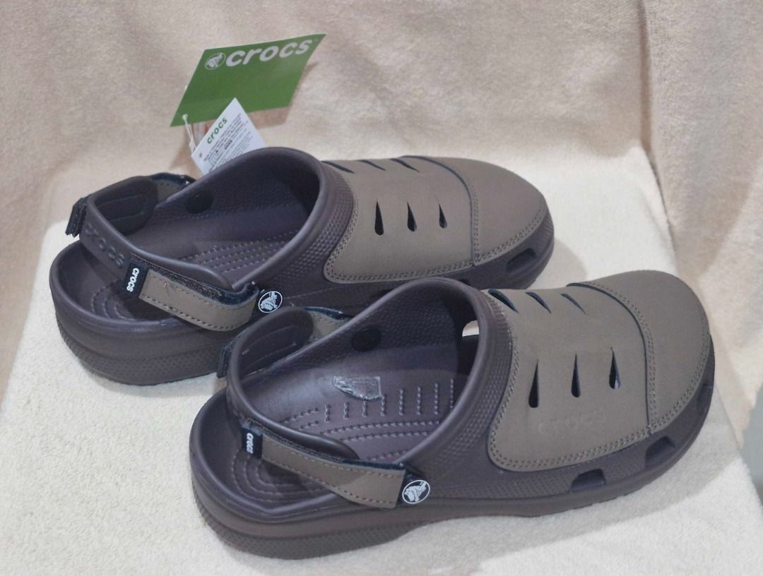 Crocs Sandals with Adjustable Strap (Category: Slippers & Slides) located in Davao. Submitted by j_guitarist (Listing ID 1464966831, Image 3). Description: - Size: EU size 42-43, US size 9 - Inner length size: 27 cm - Color: Brown - Brand: Crocs - Fit: Adjustable heel strap for a secure and comfortable fit .
