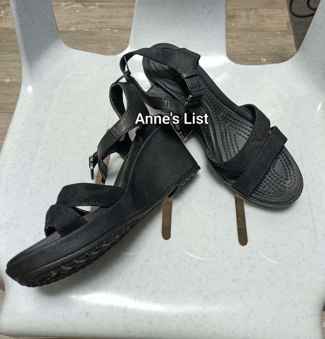 Crocs Wedge Sandals Black Size W6 (Category: Wedges) located in Santa Maria. Submitted by anne_s.list (Listing ID 1464784121, Image 1). Description: - Brand: Crocs - Style: Wedge sandals with supportive wedge heel - Color: Classic Black - Size: Women's W6 (tag attached inside strap) - Comfort: Dual comfort insoles for all-day wear - Fit: Adjustable buckle straps for a secure ankle fit - Traction: Textured outsoles for good grip - Origin: Made in 