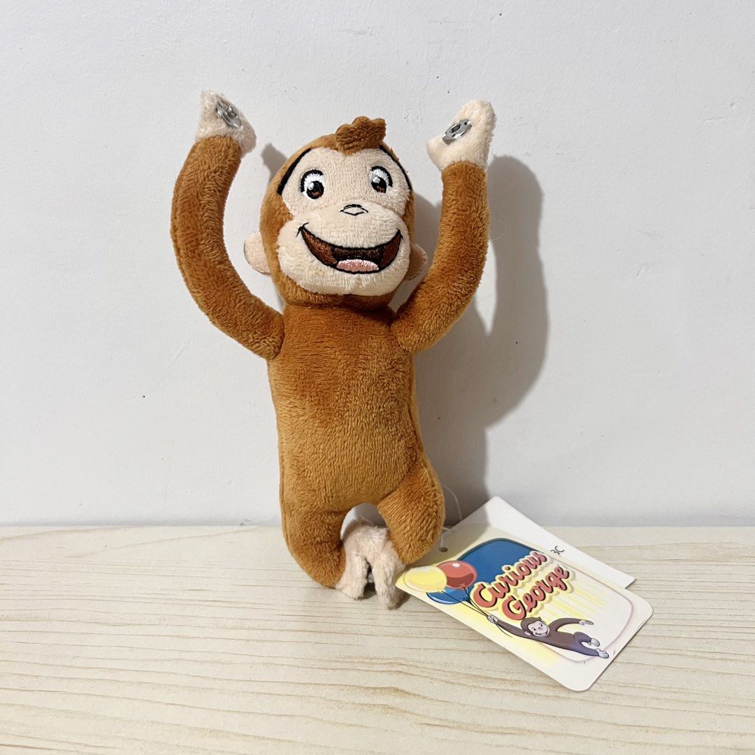 Curious George Plush Charm 15cm - Php 100 NOTE: faded tag (Category: Character Goods) located in Davao. Submitted by pandorastoybox (Listing ID 1464913210, Image 1). Description: Curious George Plush Charm 15cm - Php 100 NOTE: faded tag .
