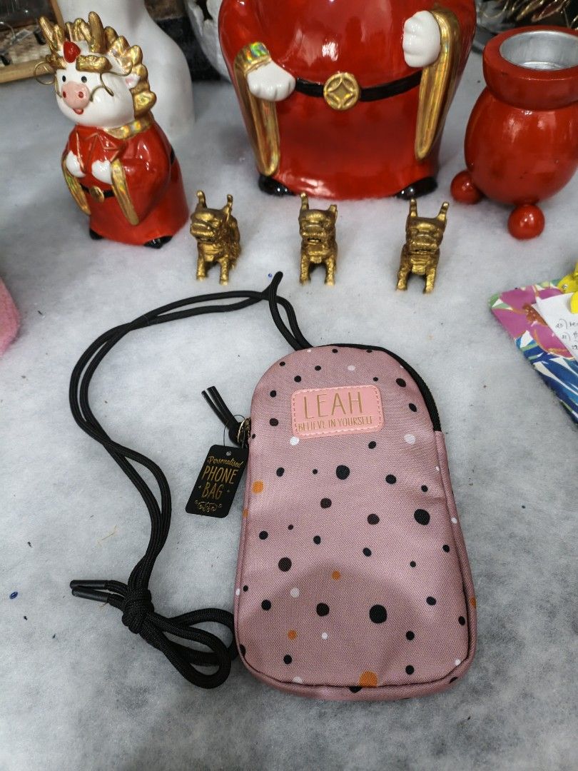Cute Elegant Personalized " LEAH" Phone Bag (Category: Purses & Pouches) located in Taguig. Submitted by lmluxboutique (Listing ID 1464820961, Image 2). Description: Pink Polka Dot Pattern and the Name " LEAH" with the txt Believe in yourself. NO DAMAGE WITH TAG.
