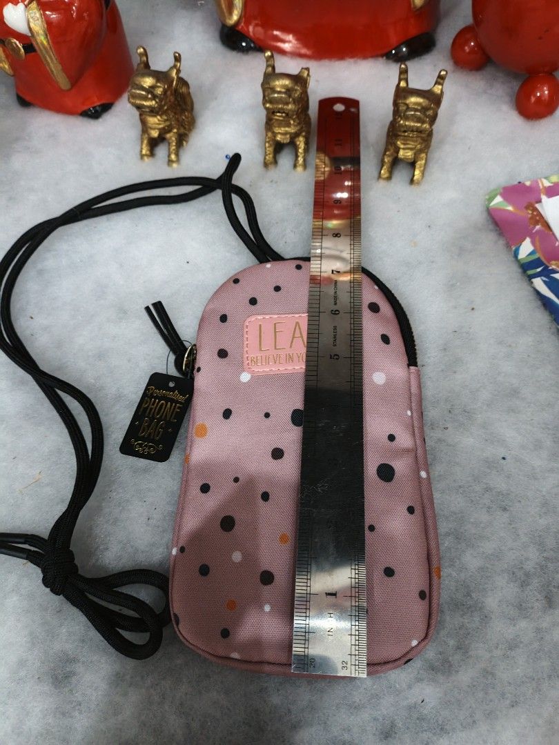 Cute Elegant Personalized " LEAH" Phone Bag (Category: Purses & Pouches) located in Taguig. Submitted by lmluxboutique (Listing ID 1464820961, Image 3). Description: Pink Polka Dot Pattern and the Name " LEAH" with the txt Believe in yourself. NO DAMAGE WITH TAG.