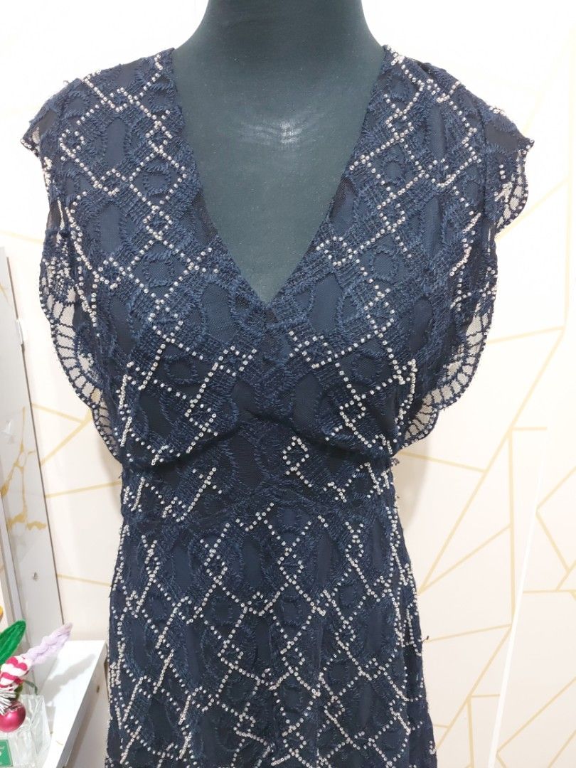 Dark Blue Lace Dress with Beaded Diamond Pattern (Category: Dresses) located in Manila. Submitted by jollyann_b1990 (Listing ID 1464892601, Image 2). Description: - Color: Dark blue - Design: Lace with beaded diamond pattern - Neckline/Sleeves: V-neck with layered short sleeves and scalloped hems - Length: Midi length with sheer hem panel - Closure:one side zipper - Fit: Lightweight and very comfortable.