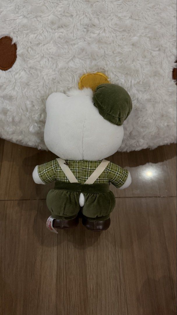 Dear Daniel Hello Kitty Plush (Category: Plushies & Soft Toys) located in Cabadbaran. Submitted by cinnamororr (Listing ID 1464961070, Image 2). Description: - Dressed in a charming green plaid shirt, overalls with suspenders, matching cap, and brown shoes - Original cloth tag still attached at the back.