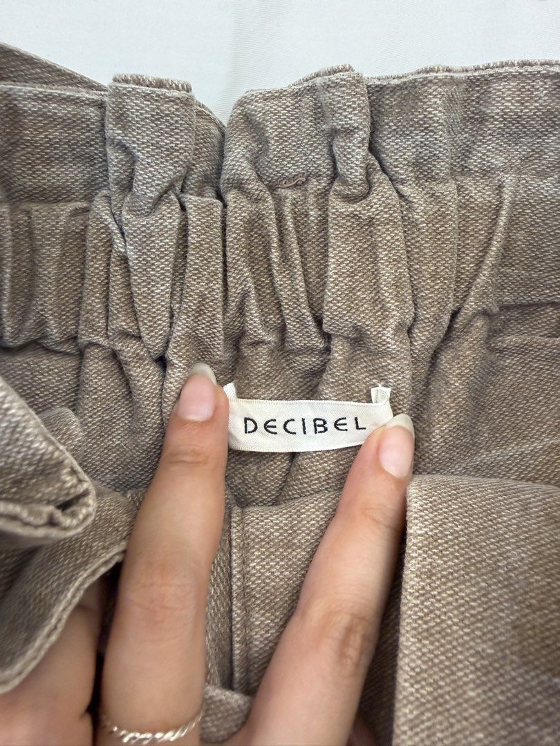 Decibel Waist Cuffed Wide Leg Pants (Category: Jeans) located in Antipolo. Submitted by aiyecandl (Listing ID 1464853478, Image 3). Description: - Brand: Decibel - Color: Neutral brown - Fit: Super relaxed wide leg with pleated front - Waist: High-waisted with elastic ruffle waistband and matching grommet belt. Fits XS-S (Elastic Waistband) - RFS: Not my style anymore. .