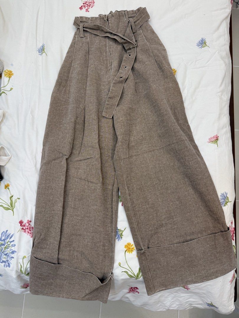 Decibel Waist Cuffed Wide Leg Pants (Category: Jeans) located in Antipolo. Submitted by aiyecandl (Listing ID 1464853478, Image 2). Description: - Brand: Decibel - Color: Neutral brown - Fit: Super relaxed wide leg with pleated front - Waist: High-waisted with elastic ruffle waistband and matching grommet belt. Fits XS-S (Elastic Waistband) - RFS: Not my style anymore. .