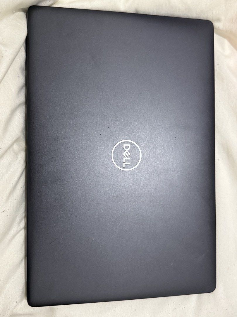 Dell Latitude Laptop Intel Core i5 (Category: Laptops & Notebooks) located in Manila. Submitted by mdbuno (Listing ID 1464891113, Image 2). Description: - Model: Dell Business Laptop (Dark Grey) - Processor: Intel Core i5 - OS: Windows (tested and working) - Features: Standard keyboard, trackpoint nub, large trackpad, rubber feet, and cooling vents - Condition: Minor scuffs on the outer lid from normal carrying, fully functional - Inclusions: Lap