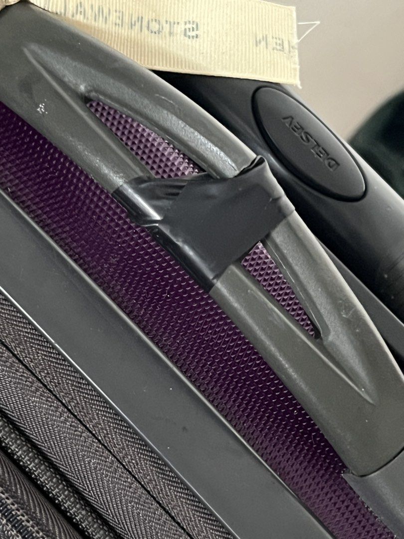 Delsey Purple Hard Case Luggage 24” 4 wheels (Category: Luggage) located in Bulacan. Submitted by e.rose (Listing ID 1464803480, Image 3). Description: Selling Delsey Hard Case Luggage 🧳 Brand: Delsey - Designed in USA Color: Purple Size: Medium 24 inch Features: - 4 Spinner Wheels - TSA Lock - Telescopic Handle - Hard Shell, Durable - Interior: Purple stripes with compression straps + zipper pocket Condition: Well-Used - Minor scratches outside