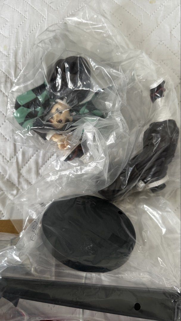 Demon Slayer Kamado Tanjiro Action Figure (Category: Figurines & Statues) located in Bulacan. Submitted by lesgoohtcg (Listing ID 1464800542, Image 2). Description: Demon Slayer Kamado Tanjiro Action Figure Condition: Mint in box Pick up loc: Sta. Maria Bulacan Via lalamove, grab express, or jnt express - 100% authentic - Comes with original box and internal plastic packaging - Box has minor shelf wear, but the figure inside is pristine and undam