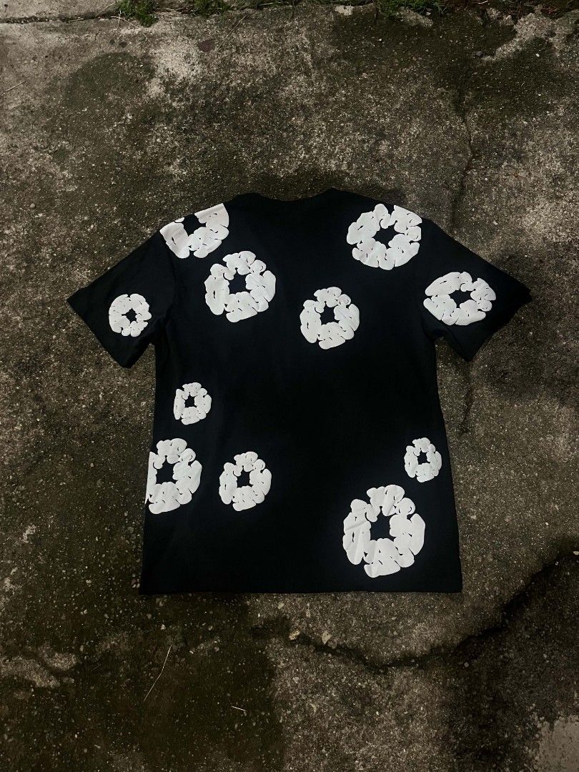 Denim Tears Tee (Category: Tshirts & Polo Shirts ) located in Leyte. Submitted by g.tmills24 (Listing ID 1464942644, Image 2). Description: Want to sell.✨ Denim Tears Tee Size: Small on tag Fits Large Width: 21 Length: 28 Issue: see on last pic fresh from bale Excellent to As New Dm me💌.