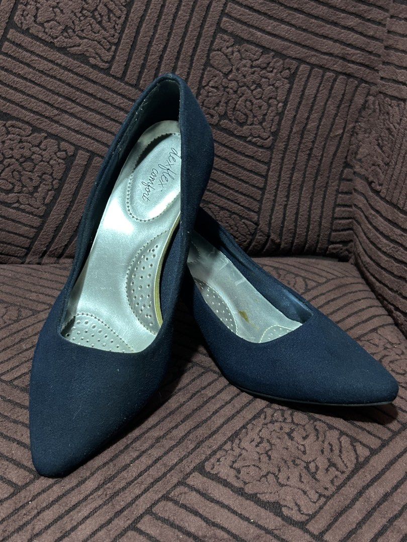 Dexflex Comfort Navy Blue Pointed Toe Heels Size 7 (Category: Heels) located in Binan City. Submitted by lehcarsmusthaves (Listing ID 1464948150, Image 1). Description: - Brand: Dexflex Comfort - Size: US 7 - Color: Navy blue suede (soft fabric upper) - Heel Type: Kitten heels - Comfort: Cushioned silver insoles - Soles: Rubber soles with light dust/wear - Style: Classic pointed toe, ideal for work or formal events.